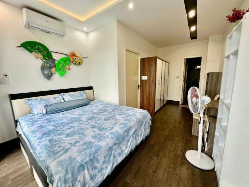 Ένα ή περισσότερα κρεβάτια σε δωμάτιο στο CONIHOUSE - Homestay & Villa