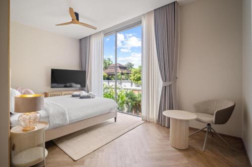 Postel nebo postele na pokoji v ubytování Subata Villa AMAS, Bang Tao