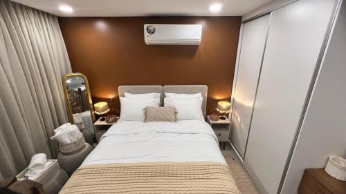 Llit o llits en una habitació de Apartmento en Edificio Fronterra