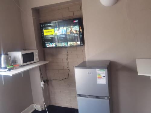 Η κουζίνα ή μικρή κουζίνα στο Yellow Stars Guesthouses