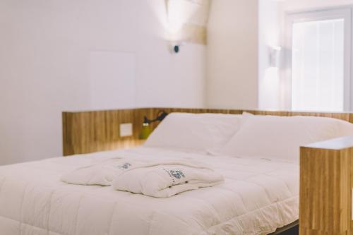 Una cama o camas en una habitación de Cinquevite