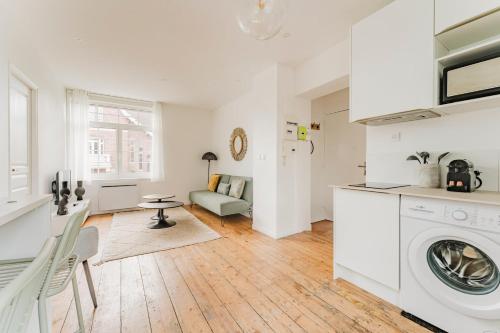 Kuchyň nebo kuchyňský kout v ubytování Appartement 1 chambre proche Croisé Laroche & tram