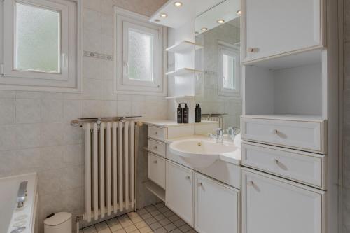 Koupelna v ubytování Le Montagny Sejour Cosy au Coeur des Alpes