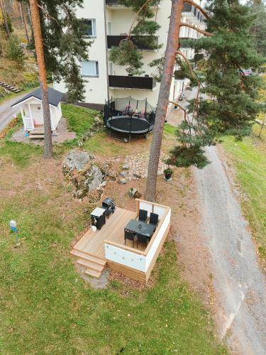 an overhead view of a deck with a table and chairs at Evevilla in Nokia
