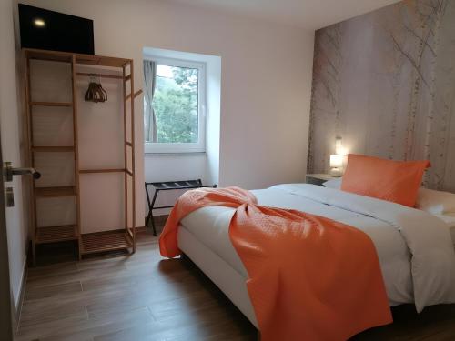 Postel nebo postele na pokoji v ubytování Casa Aurora