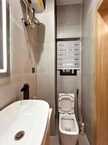 O baie la Selina Apartment