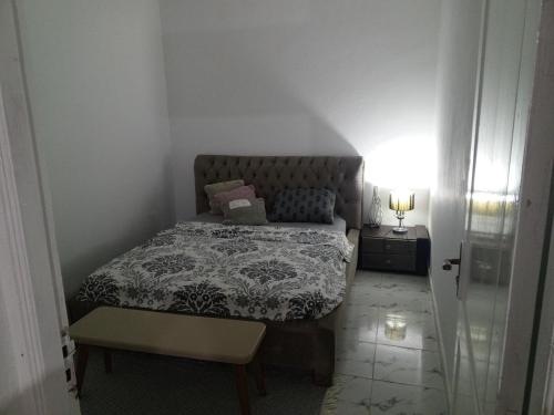 Una cama o camas en una habitación de Dar Samira