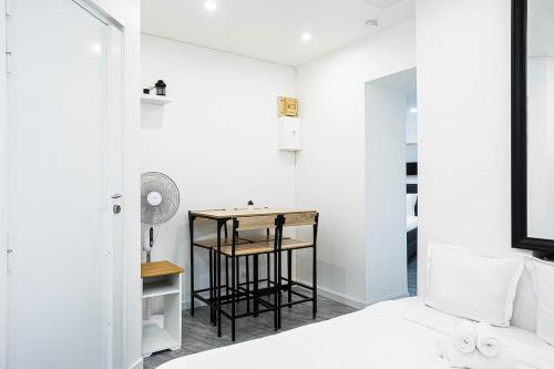 Postel nebo postele na pokoji v ubytování Charming 1-Bedroom Apartment Near Paris