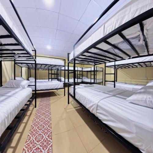 Ένα ή περισσότερα κρεβάτια σε δωμάτιο στο Vista Inn Patong