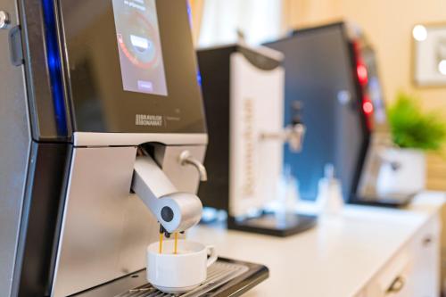 Kuchyň nebo kuchyňský kout v ubytování Spa Resort PAWLIK-AQUAFORUM