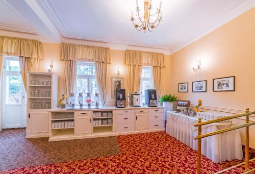 Kuchyň nebo kuchyňský kout v ubytování Spa Resort PAWLIK-AQUAFORUM