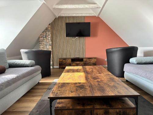 Μια τηλεόραση ή/και κέντρο ψυχαγωγίας στο Ferienhaus Panorama