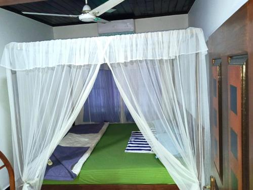 Ένα ή περισσότερα κρεβάτια σε δωμάτιο στο Coco hill Villa