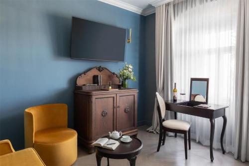 TV a/nebo společenská místnost v ubytování Schloßhotel Althörnitz