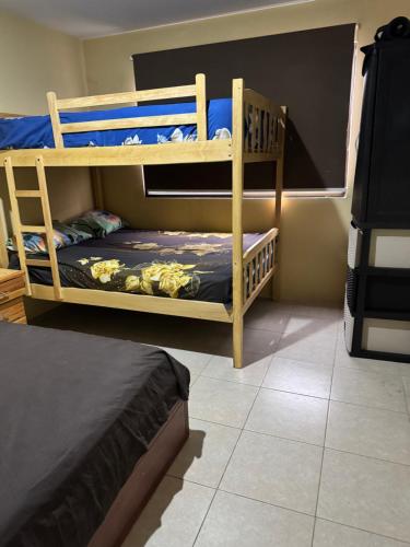 Ένα ή περισσότερα κρεβάτια σε δωμάτιο στο Apartamento vacacional con playa privada