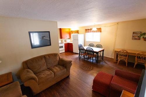 a living room with a couch and a table at JW Vallecito in Vallecito