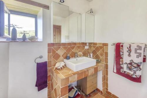 Vannituba majutusasutuses Maison confortable avec jardin à Talon - 90 m²