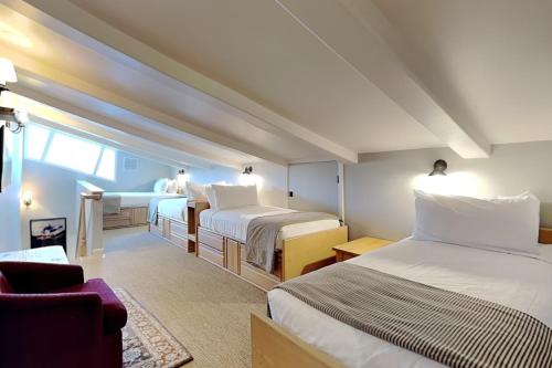 a hotel room with two beds and a couch at Timberline Condominiums 2 Bedroom plus Loft 3 Bath Deluxe Unit D3D in Snowmass Village
