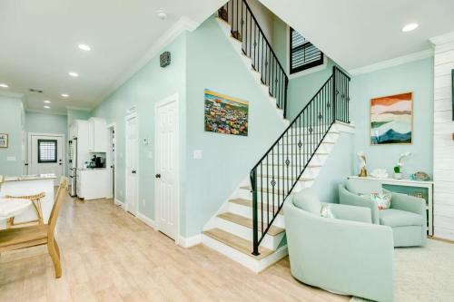 a staircase in a home with a blue and white at Exudes the Posh Life Heated Pool Fireplace & Stunning in Galveston