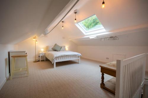 Ένα ή περισσότερα κρεβάτια σε δωμάτιο στο Lleust