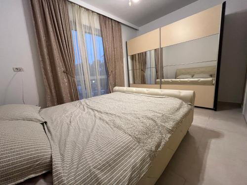 Ένα ή περισσότερα κρεβάτια σε δωμάτιο στο Urban Escape Craiova