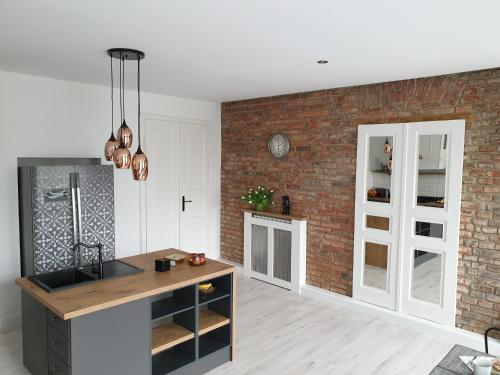 Apartament w kamienicy Przy Plantach