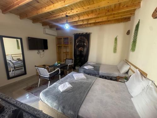 Postel nebo postele na pokoji v ubytování Jory Studios