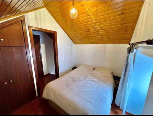 Postel nebo postele na pokoji v ubytování Casa das maravilhas