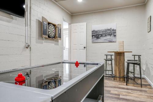 a kitchen with a glass counter top in a room at NEW Howdy House, Walk to TSU, Gameroom & Yard in Stephenville