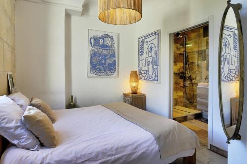 Ένα ή περισσότερα κρεβάτια σε δωμάτιο στο HP2 Magnifique appartement dans HP les Oliviers-2