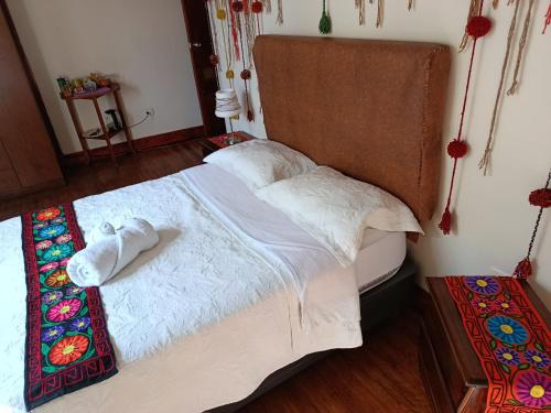 Postel nebo postele na pokoji v ubytování Habitación Boutique Privada Centro de Cusco