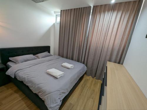 Llit o llits en una habitació de Terasa Center