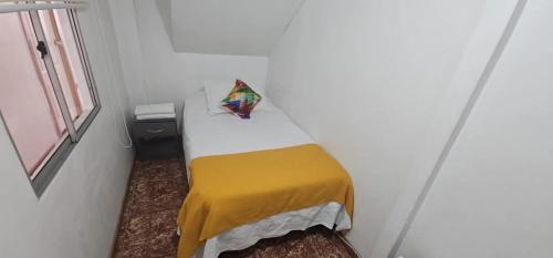 Ένα ή περισσότερα κρεβάτια σε δωμάτιο στο Vicmar 2