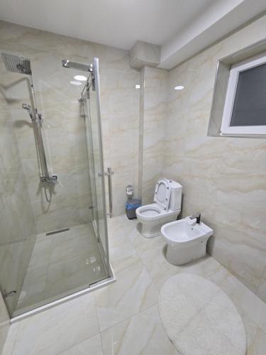 Koupelna v ubytování Fejzullahu apartments