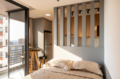 Postel nebo postele na pokoji v ubytování Alto & Estilo | Batel