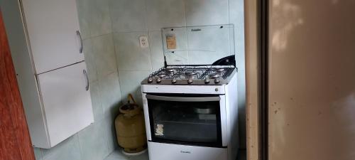 Η κουζίνα ή μικρή κουζίνα στο Casa de temporada