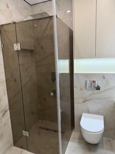 Ένα μπάνιο στο Apartment Uman