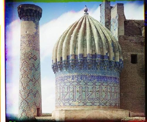 a large building with a dome and a pillar at Hotel Javlonbek 1 in Samarkand