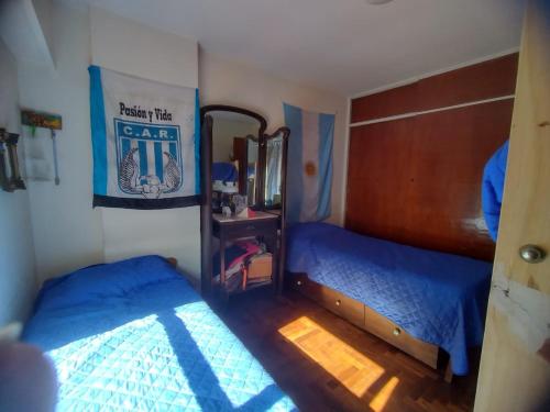 Postel nebo postele na pokoji v ubytování Cama en habitacion compartida