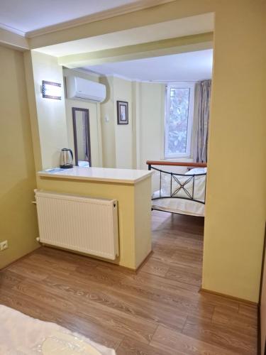 Postel nebo postele na pokoji v ubytování Apartments Firosmani Rooms