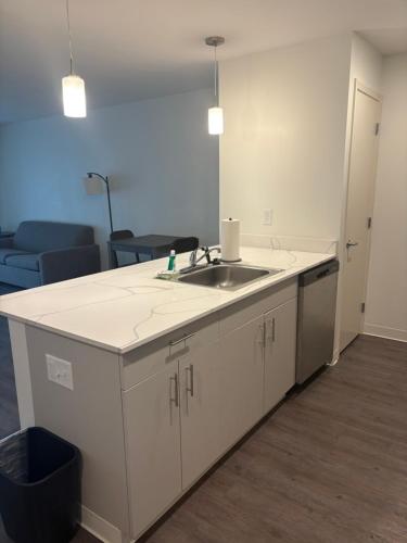 a kitchen with a sink and a counter top at THE NEST in Greenfield