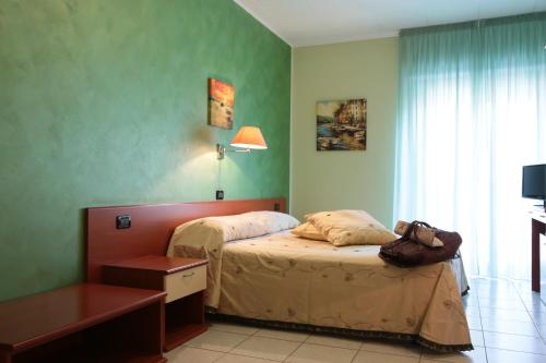Et rom på Hotel Leon - Ristorante Al Cavallino Rosso