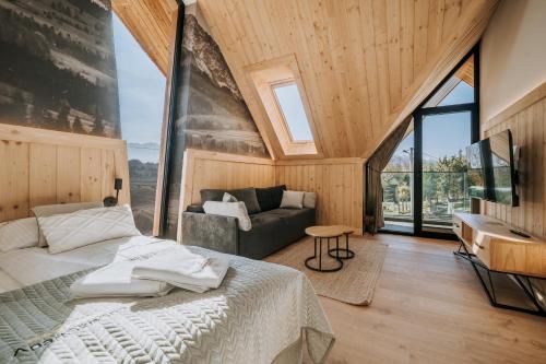 Χώρος καθιστικού στο Harenda Apart Ski&Spa - luksusowe domki z sauną, jacuzzi i klimatyzacją