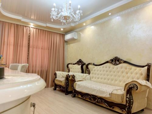 Posezení v ubytování 3 Rooms of the Sun