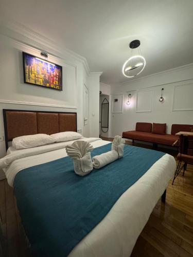 Ένα ή περισσότερα κρεβάτια σε δωμάτιο στο Veva Hotel