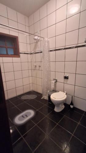 Ένα μπάνιο στο Santos & Oliveira