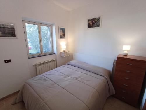 Postel nebo postele na pokoji v ubytování Domus Mare