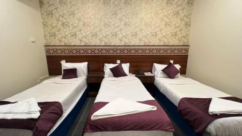 Katil atau katil-katil dalam bilik di Hayat Almansi Hotel