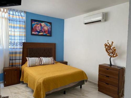 Ένα ή περισσότερα κρεβάτια σε δωμάτιο στο Comfortable House, 7 minutes from Playa la Audiencia