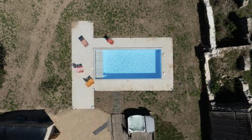 Bazén v ubytování Domaine de Linguinou nebo v jeho okolí